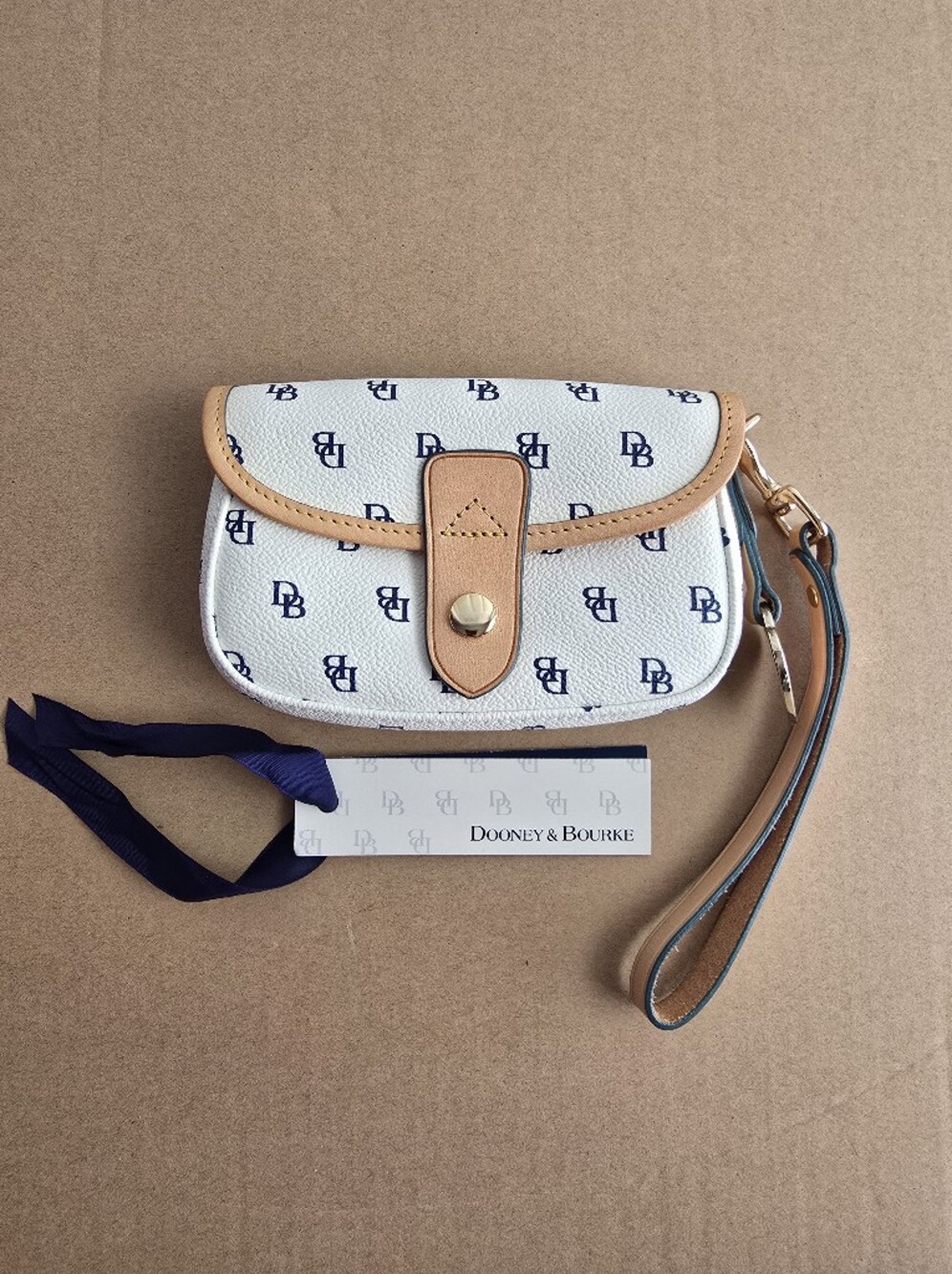Dooney & Bourke White and Tan Logo Wristlet